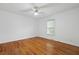 Simple bedroom with hardwood floors, ceiling fan and natural light at 4735 W Park Pl, North Charleston, SC 29405