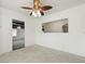 Bright dining room featuring a ceiling fan and an opening to the other room at 4735 W Park Pl, North Charleston, SC 29405