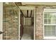 View of the home's light-filled interior through the front door at 4735 W Park Pl, North Charleston, SC 29405