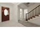 Inviting entryway featuring decorative tile, stairs and access to other rooms at 4735 W Park Pl, North Charleston, SC 29405