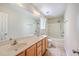 Bright bathroom with double sinks, a large mirror, and a shower-tub combo at 4831 Carnoustie Ct, Summerville, SC 29485