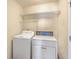 Dedicated laundry room featuring side-by-side washer and dryer units at 4831 Carnoustie Ct, Summerville, SC 29485