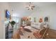 Bright living room features a fireplace, vaulted ceilings, hardwood floors, and an open floor plan at 4831 Carnoustie Ct, Summerville, SC 29485