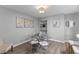 Cozy dining area with a glass table, clear chairs, and contemporary decor at 55 Ashley Ave # 6, Charleston, SC 29401