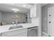 Modern kitchen featuring stainless steel appliances, white countertops, and ample storage at 55 Ashley Ave # 6, Charleston, SC 29401