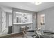 Bright kitchen features stainless steel appliances, breakfast bar, and modern finishes at 55 Ashley Ave # 6, Charleston, SC 29401