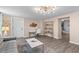 Open floor plan featuring modern decor, luxury vinyl flooring and lots of natural light at 55 Ashley Ave # 6, Charleston, SC 29401