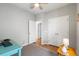 Bright bedroom featuring a desk area and closet space, offering a comfortable and functional space at 557 Blueway Ave, Summerville, SC 29486