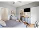 Comfortable main bedroom with two dressers and a television, showcasing a cozy and inviting retreat at 557 Blueway Ave, Summerville, SC 29486