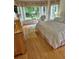 Bedroom featuring a large window and a cozy bed at 605 Pointe Of Oaks Rd, Summerville, SC 29485