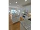 Modern kitchen featuring white cabinets, stainless steel appliances, and granite countertops at 605 Pointe Of Oaks Rd, Summerville, SC 29485