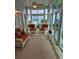 Cozy sunroom with lots of natural light and comfortable seating at 605 Pointe Of Oaks Rd, Summerville, SC 29485