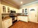 Traditional kitchen with stainless steel appliances, granite countertops, and white cabinetry at 6212 Fieldstone Cir, Charleston, SC 29414