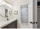 Bathroom vanity featuring modern lighting and a view of a shower at 705 Williamson Dr # C, Mount Pleasant, SC 29464