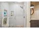Bright bathroom features a walk-in shower with stylish pebble flooring and subway tile surround at 705 Williamson Dr # C, Mount Pleasant, SC 29464