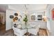 Elegant dining room featuring a glass table and contemporary decor at 705 Williamson Dr # C, Mount Pleasant, SC 29464