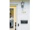 Home with a quaint exterior, complete with vintage light fixture and mailbox at 705 Williamson Dr # C, Mount Pleasant, SC 29464