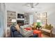 Charming living room featuring a fireplace, built-in shelving and stylish furniture at 705 Williamson Dr # C, Mount Pleasant, SC 29464