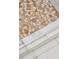 Close-up of shower floor with unique stone tile design at 705 Williamson Dr # C, Mount Pleasant, SC 29464