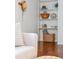 Cozy sitting room with natural light, built in shelves, and hardwood floors at 705 Williamson Dr # C, Mount Pleasant, SC 29464