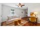 Sitting room featuring wood floors, a comfortable sofa, and a small desk at 705 Williamson Dr # C, Mount Pleasant, SC 29464