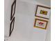Close up of artwork along white staircase walls at 705 Williamson Dr # C, Mount Pleasant, SC 29464