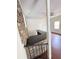 View of the basement featuring a brick accent wall and wet bar with hardwood floors at 710 Gadsden Loop, Walterboro, SC 29488