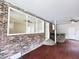 Basement featuring a decorative partition wall, brick accent, and a small bar area at 710 Gadsden Loop, Walterboro, SC 29488