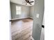 Bedroom showcasing wood-look floors and a window with lots of natural light at 710 Gadsden Loop, Walterboro, SC 29488