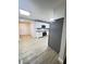 Modern kitchen features stainless steel appliances and white cabinetry at 710 Gadsden Loop, Walterboro, SC 29488