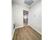 Small laundry room with hookups, wood-look flooring, and neutral walls at 710 Gadsden Loop, Walterboro, SC 29488