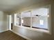 Bright living room featuring a decorative partition, ceiling fans, and neutral paint at 710 Gadsden Loop, Walterboro, SC 29488