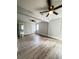 Expansive living room featuring neutral paint, ceiling fans, and wood-look flooring at 710 Gadsden Loop, Walterboro, SC 29488