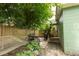 Backyard featuring a hammock, a grill and a wooden privacy fence at 716 White Oak Dr, Charleston, SC 29407