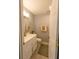 Compact bathroom featuring a vanity with storage, a toilet, and neutral paint at 716 White Oak Dr, Charleston, SC 29407