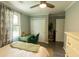 Comfortable bedroom featuring a desk, large window, and neutral paint at 716 White Oak Dr, Charleston, SC 29407