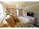 Bright bedroom featuring a ceiling fan, neutral paint, and a large window for natural light at 716 White Oak Dr, Charleston, SC 29407