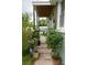 Inviting front porch with potted plants and charming details at 716 White Oak Dr, Charleston, SC 29407