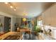 Bright kitchen and dining area with modern appliances, granite countertops, and ample natural light at 716 White Oak Dr, Charleston, SC 29407