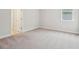 Bedroom showcasing neutral carpet, white walls, and baseboards, providing a clean and modern look at 735 Breakers Reef Ln, Huger, SC 29450