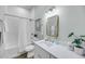 Modern bathroom with white subway tile shower, vanity, and stylish decor at 7413 Indigo Palms Way, Johns Island, SC 29455