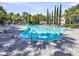 Enjoy a refreshing swim in this large pool, surrounded by comfortable lounge chairs and beautiful landscaping at 7413 Indigo Palms Way, Johns Island, SC 29455