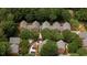Aerial view of charming townhomes nestled among lush trees in a well-maintained community at 760 Natchez Circle Cir, Mount Pleasant, SC 29464