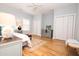Comfortable bedroom featuring a chest, wood floors, and bi-fold doors, complemented by neutral wall paint at 760 Natchez Circle Cir, Mount Pleasant, SC 29464