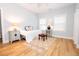 Serene bedroom with wood floors and two windows, bedside tables with lamps, creating a relaxing retreat at 760 Natchez Circle Cir, Mount Pleasant, SC 29464