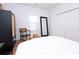 Bright bedroom features natural light, closet, and wood floors, with a chair adding comfort to the space at 760 Natchez Circle Cir, Mount Pleasant, SC 29464