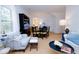 Inviting living room featuring hardwood floors, comfortable seating, and an adjacent dining area at 760 Natchez Circle Cir, Mount Pleasant, SC 29464