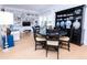Bright living room boasts hardwood floors, custom built-ins, large windows, and comfortable seating at 760 Natchez Circle Cir, Mount Pleasant, SC 29464