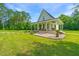 Inviting two-story home with a covered porch and beautifully landscaped front yard at 810 Highway 61, Ridgeville, SC 29472