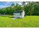 Outdoor shed with double doors and ramp, perfect for storage or a workshop at 810 Highway 61, Ridgeville, SC 29472